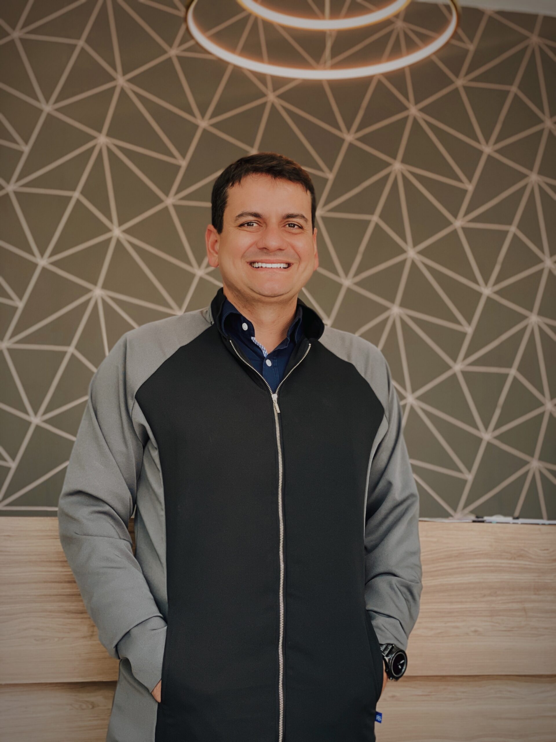 a man smiling at camera